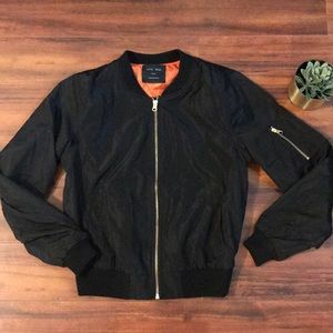 Black Bombers jacket for sale. Size small.